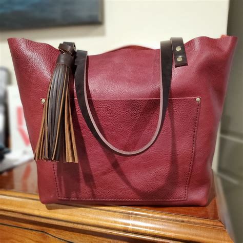 Portland leathers - Lucy Shoulder Bag. (547) $118. $89. with code SPRING25. View Details. Our leather bags are versatile, functional, and beautiful. A leather purse is an absolute staple to every wardrobe. From stunning leather Tote Bags to minimally designed Bucket Bags, each one is handmade from the finest full-grain hides creating a personalized leather handbag ... 